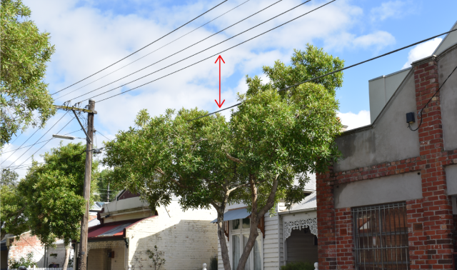 Arrows indicate gap between overhead wires