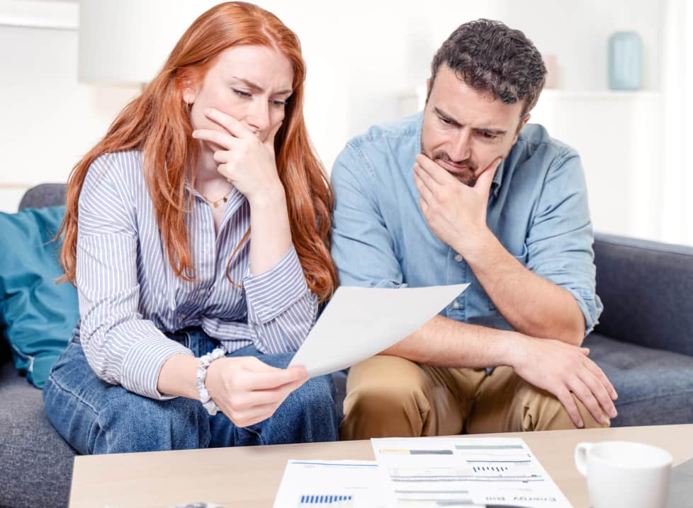Two people looking over a rental agreement